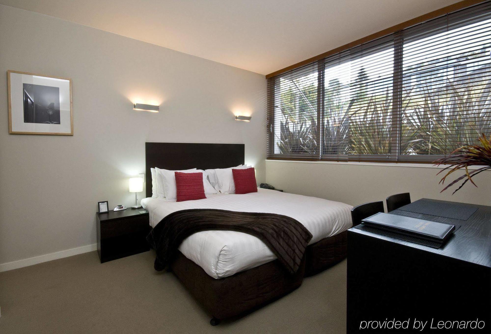 Swiss-Belsuites Pounamu Queenstown Zimmer foto A bedroom at the hotel
